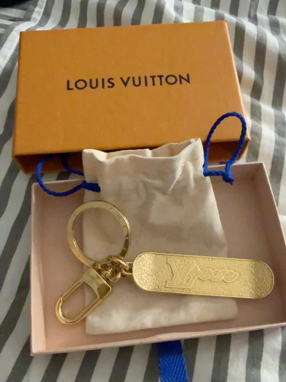 Louis Vuitton Gold Textured Leather Logo & Charm/Key Holder